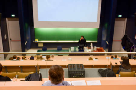 Business conference with audience listening to the speaker.の写真素材