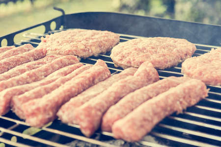 Minced meat on a grill. Barbeque with grilled meat.の写真素材