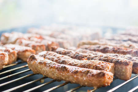 Minced meat on a grill. Barbeque with grilled meat.の写真素材
