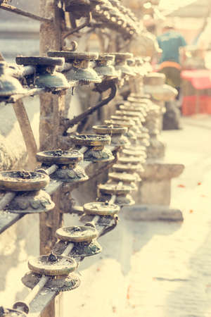 Butter candles. Closeup of many candles at Monkey temple, Kathmandu.の写真素材
