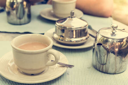 Masala tea set. Table with traditional tea setting.の写真素材