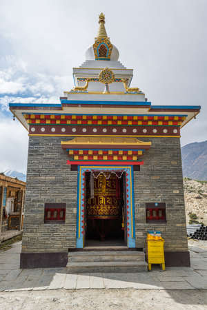 Buddhist praying wheel in a building. Annapurna circuit, Nepal.の写真素材