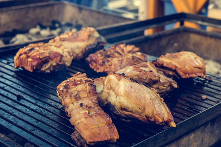 Crispy pork on barbeque. Outdoor kitchen and street food photography.の写真素材