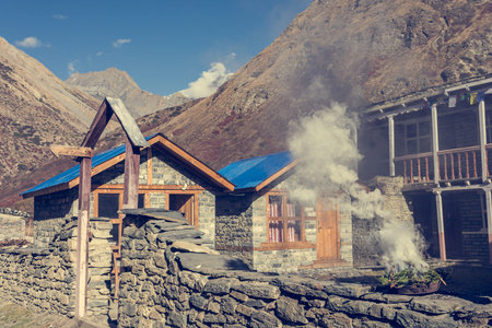 Buddhist morning ceremonial incense smoking. Annapurna circuit trek in Nepal.の写真素材