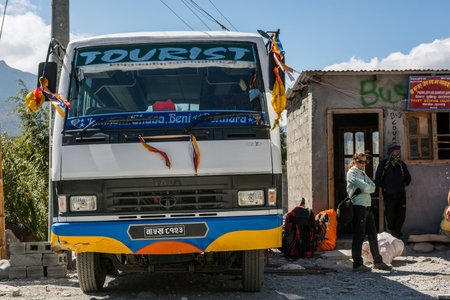 Jomsom, Nepal - October 19: People buying ticket and waiting for bus to arrive, on October 19 2015...