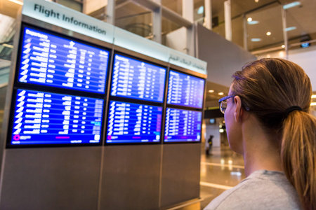 Young female traveler deciding where to go.の写真素材