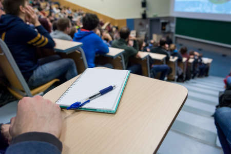 Taking notes at conference.の写真素材