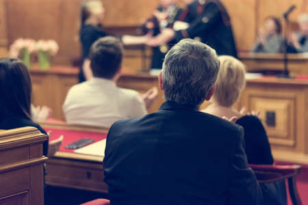 Audience at a official ceremony.の写真素材