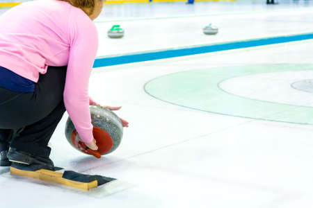 Playing a game of curling.の写真素材