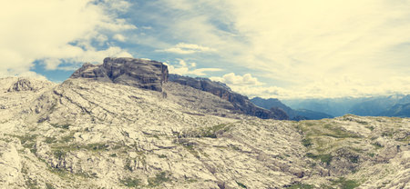 Panoramic mountain view of Italian Dolomites from Passo Groste. Begining of Via Bocchete Ferrata.