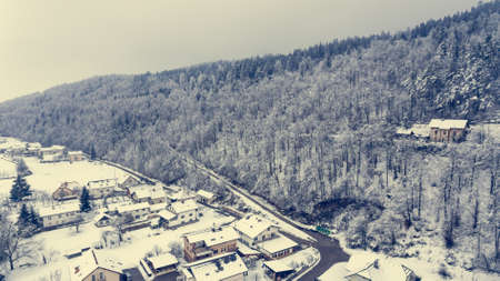 Aerial view of snow covered town.の写真素材