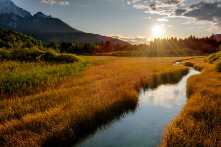 Sunset landscape at Zelenci natural spring reserve.の写真素材