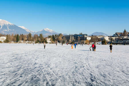 Bled, Slovenia - January 22: People walking on frozen lake, Rare climate event on January 22 2017 in Bled, Slovenia.のeditorial素材
