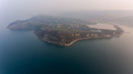 Aerial view of cliffs raising above sea.の写真素材