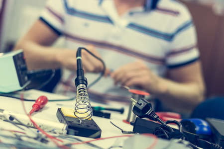 Electrician soldering wires.の写真素材