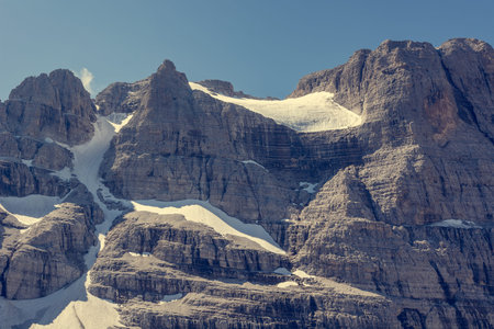 Mountain glacier ending with a sheer drop.の写真素材