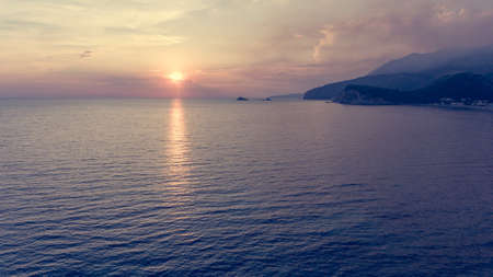 Spectacular aerial view of coastline at sunset.の写真素材