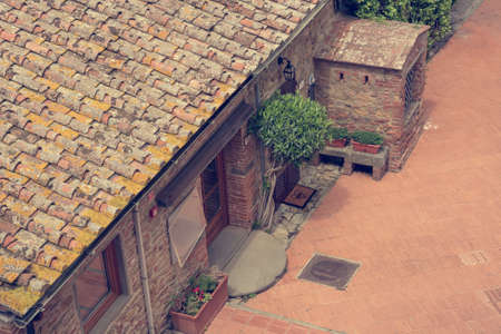 Drop down view of traditional brick layed courtyard.の写真素材