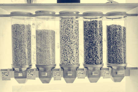 Dispensers for bulk shopping with various eco ingredients encouraging zero waste lifestyle.の写真素材