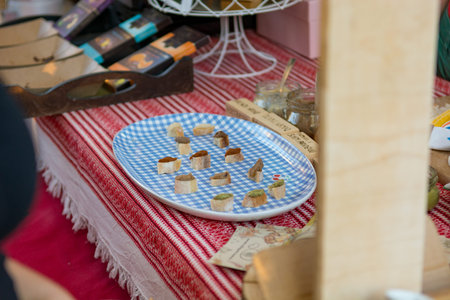 Delicious finger food deserts sold at outdoor market place. Eating healthy.