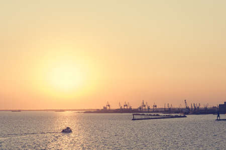 Spectacular panorama view of sun setting into Thermaic gulf.の写真素材