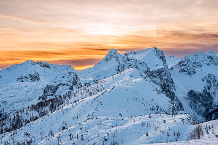 Spectacular winter mountain panoramic view of mountains at sunset.の写真素材