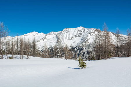 Spectacular winter mountain panorama high in austrian alps.