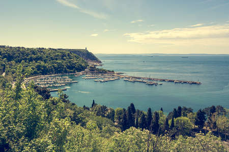Spectacular sea view of luxury port with many yachts. Sistiana and Castelreggio, Italy.の写真素材