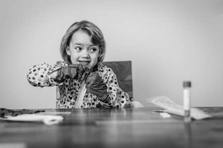 Cute blonde girl self testing for corona virus and waiting for results.の写真素材