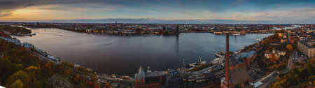 Beautiful landscape photo of Stockholm cityscape viewed from Skinnarviksberget on early evening in autumn. Beautiful Stockholm evening panorama from famous vantage point.の写真素材
