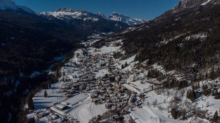 Aerial drone view of valley around Cortina d'Ampezzo, looking from the village of Volo di Cadore...