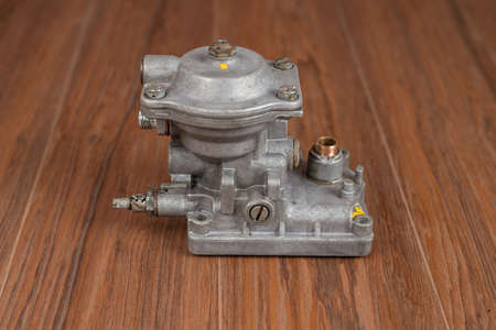 Part of an automotive diesel injection pump. Old style high pressure diesel pump cover with bushing exposed.の写真素材