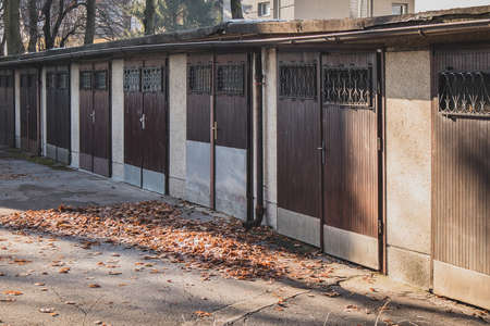 Row of old and socialistic garages or parking boxes made in the sixties in eastern europe.の写真素材