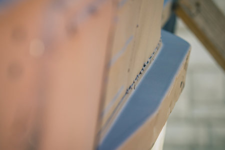 Poor welding job on a vintage car in renovation. Spot welds on new sheet metal welded on a car body. Terrible automotive welding without real strengthの写真素材