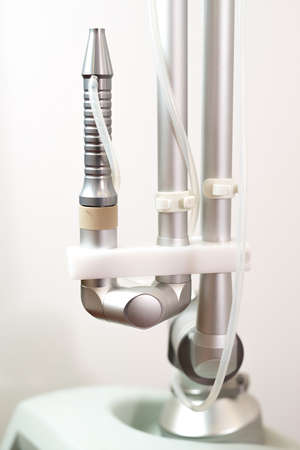 Medical laser head used for vaginal treatment of incontinence on a whit studio background.の写真素材