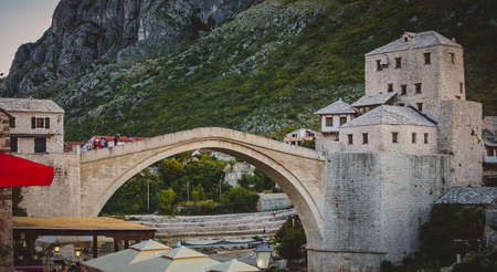 Panoramic photo of Mostar stone bridge in an evening atmosphere.の写真素材