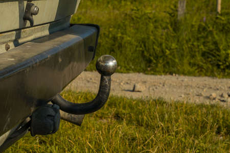 Old and worn towing knob or hook on a car or minivan.の写真素材