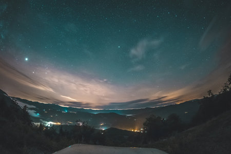 Starry night panorama above the Osilnica village in Slovenia, looking towards south. Starry night just after sunset.の写真素材