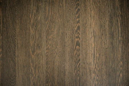 Texture of a surface made of dark wood.の写真素材