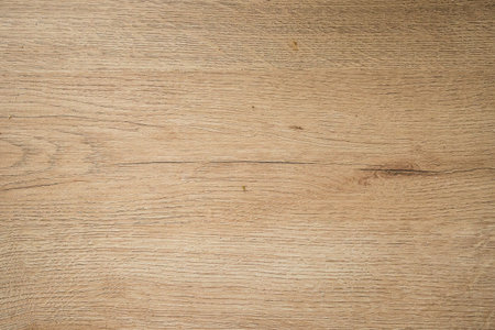 Texture of a surface made of light wood.