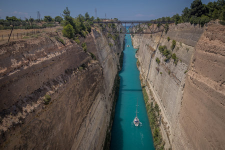 Corinth or corinthian canal in Greece. A narrow waterway that connects Ionic sea with Aegean sea....