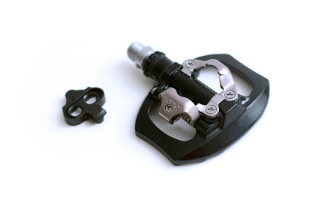 Modern bicycle pedals in different styles with clips isolated on white background.の写真素材