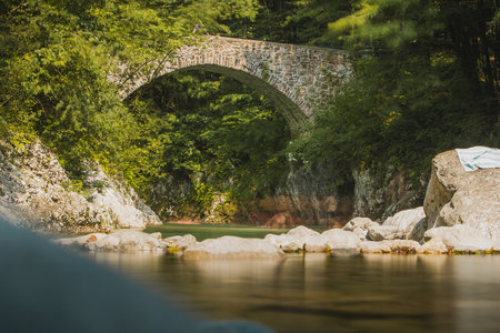 Napoleon's bridge on Nadige river in Kobarid region in Slovenia. Beautiful stone bridge over Nadige riverの写真素材