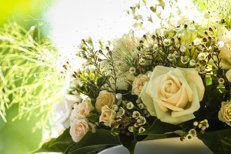 A bouquet with flowers and other plants in autumn colors. Strong backlightの写真素材