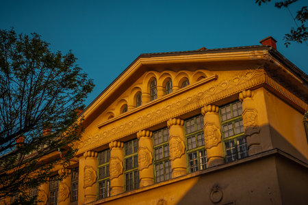 Detail of front facade of Gymnastics hall Tabor in Ljubljana on a sunny morning.の写真素材