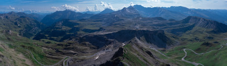 Aerial panorama of hochtor, viewed far from above. Epic view of the tunnel on austrias highest motorable road. Majestic alpine panorama aroubnd Grossglocknerの写真素材