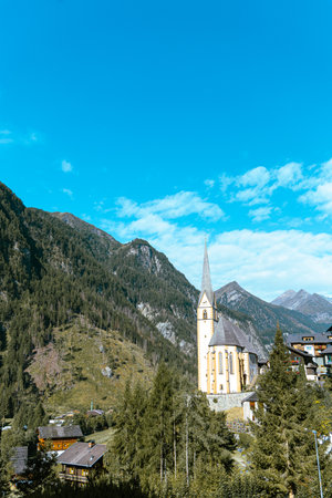 Beautiful village of Heiligenblut in central austria, the base village from Grossglockner alpine region. Beautiful church visible in the centre of the village, summer timeの写真素材