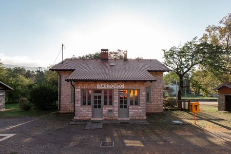 Border train station of Rakitovec on a border between Slovenia and Croatia in early morning. Sun just behind the station, istrian feelingの写真素材
