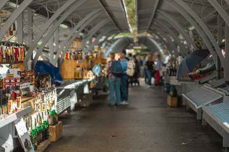 Market in Pula, Croatia on a sunny day. Typical market stalls with part which is selling fresh schnaps and honey, Istrian delightsの写真素材
