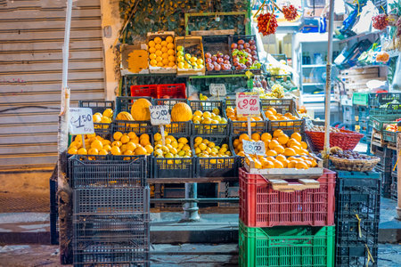 Fruit and vegetable shops in the narrow streets of napoli. Visible mediterranean fruits such as lemons, oranges, mandarines and so on. Prices vary from 1,5 to 2 euro per kilo..の写真素材